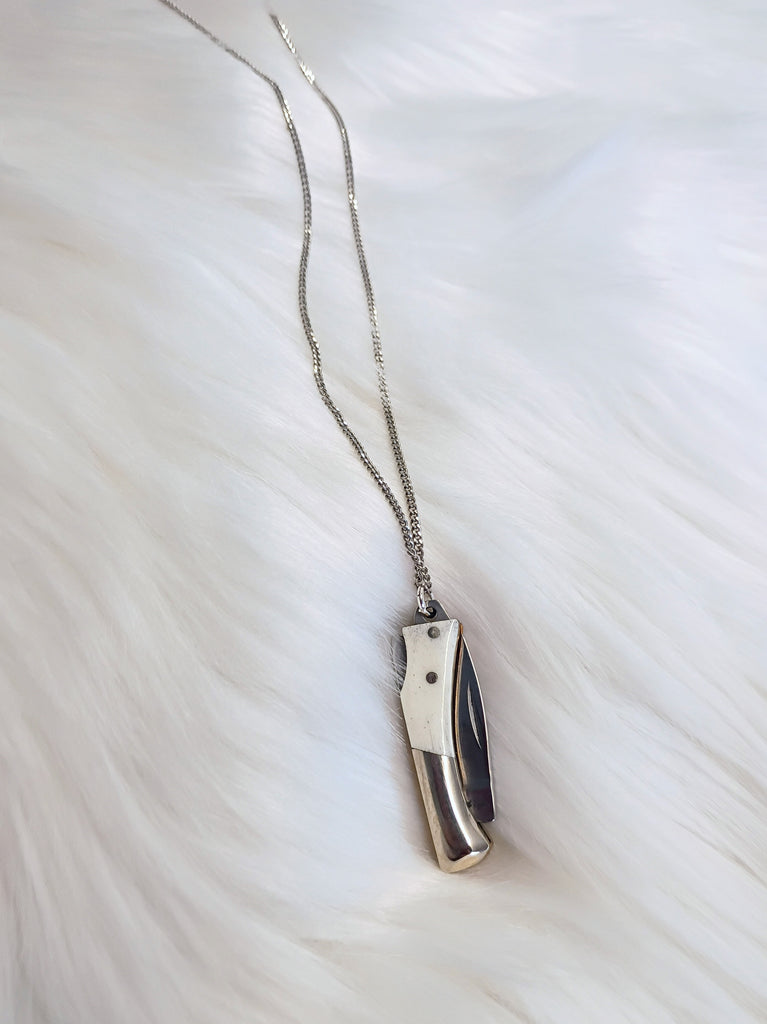Curvilinear Bone Lockback Knife Necklace