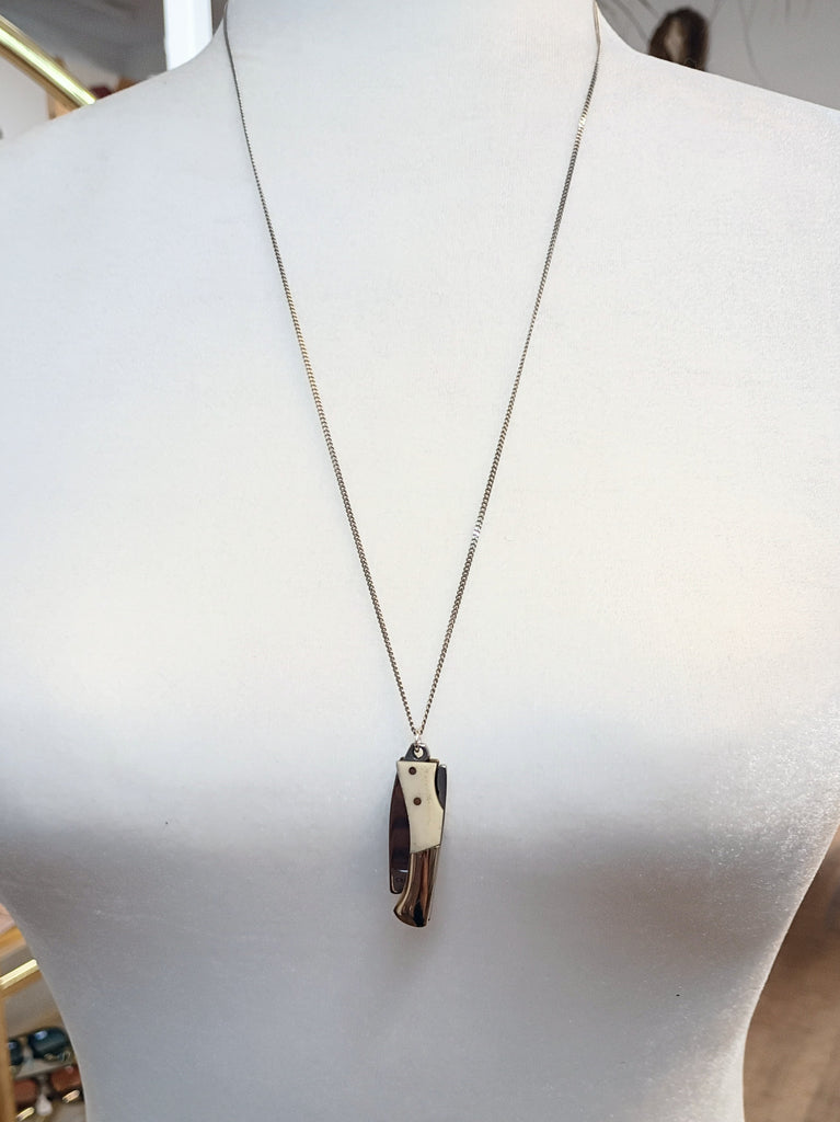 Curvilinear Bone Lockback Knife Necklace